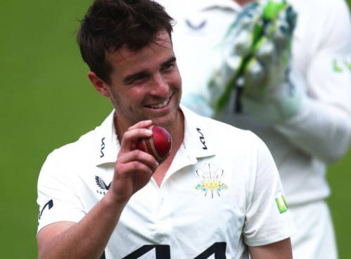टॉम लॉज़